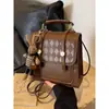 Mochila de diseño de nicho, mochila de moda para mujer, mochila escolar portátil de estilo coreano, mochila de viaje retro