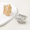 Anillo ovalado de acero inoxidable con diseño de círculo mágico hueco, moda personalizada transfronteriza europea y americana, con apertura ajustable y hebilla para bufanda