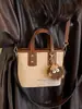 Bolso cruzado pequeño minimalista de moda transfronterizo para mujer, estilo retro 2026 nuevo, bolso cruzado diario para ir al trabajo, bolso tipo cubo tote casual