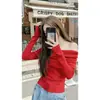 Suave top de punto de manga larga con hombros descubiertos estilo francés para mujer, nuevo diseño ajustado de otoño e invierno, adecuado para usar como prenda exterior o como capa base.