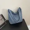 Bolso de mezclilla nuevo de otoño transfronterizo 2026, moderno y ligero, bolso tote artístico para mujer, adecuado para que los estudiantes universitarios lo lleven a clase, bolso de hombro