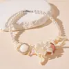 Collar de concha de resina estilo vacacional con flores geométricas y perlas artificiales para la clavícula, personalidad temperamento europeo y americano, collar de alta calidad para mujer