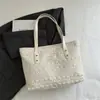 Bolso de mano de diseño nicho casual, bolsa de mano tote de gran capacidad a la moda, nuevo modelo de verano 2026, bolso cruzado simple para mujer