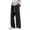 Jeans acampanados con forro de polar negro directo de fábrica para hombre, pantalones rectos holgados de moda de invierno para hombre de la alta calle americana