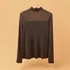 Camiseta base sexy de malla de alta gama para principios de otoño, cuello semi-alto, jersey, camiseta de manga larga, top base fino para mujer