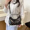 Bolso de axila de nicho de alta gama transfronterizo para mujer 2026 nuevo bolso de moda tipo albóndiga de lunares gran capacidad bandolera para el día a día