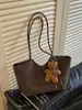 Bolso Tote Retro para Mujer 2026 Nueva Moda Textura de Moda Nicho para el Trabajo Cesta de Compras Tejida de Mano Bolso de Hombro