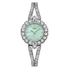 O relógio feminino redondo de quartzo mais vendido da Gedi com pulseira cravejada de diamantes, à prova d'água, estiloso e versátil, relógio de pulso feminino de nicho para o dia a dia.