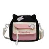 Bolsos cruzados de lona al por mayor para niñas, bolsos de hombro lindos y dulces, bolsos cruzados para estudiantes suaves y frescos