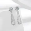 Pendientes largos de zircón vintage transfronterizos europeos y americanos, moda de lujo ligero, nicho, únicos, exagerados, pendientes de alta gama para mujer