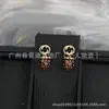 Suministro transfronterizo exclusivo de nuevos aretes estilo Gucci con etiquetas, resistentes a la decoloración, lujo ligero, diseño simple, artesanía de alta calidad