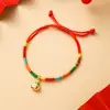 Festival del Bote del Dragón Cuerda de Mano de Cinco Colores Perro Pachacco Accesorios de Aleación Tejido de Cuerda de Cinco Colores Hecho a Mano Accesorios de Hoja de Zongzi Venta al por Mayor