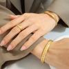 Europa y Estados Unidos no se desvanecen diseño abierto pulsera de trigo anillo de personalidad acero de titanio chapado en oro juego de joyas Z192-A150