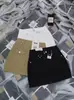 Han Mei'Er 2026 Primavera/Verano Nueva Moda Femenina Falda Corta Versátil de Cintura Alta Adelgazante Falda de Línea A Bodycon Moderna 8029