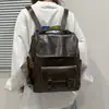 Mochila retro estilo británico para mujer, nueva mochila de moda estilo coreano 2026 para estudiantes universitarios, mochila de viaje