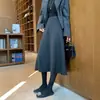 Saia midi de lã cinza super bonita feminina outono 2026 inverno nova cintura alta linha A barra larga saia de lã acetato