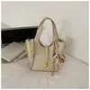 Bolsa de mão minimalista de nicho de alta moda estilo coreano para mulheres, nova bolsa tiracolo tipo balde casual e moderna da primavera de 2026
