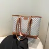 Lujo Ligero Casual Simple 2025 Nuevo Retro Moda Femenina Retro Verano Gran Capacidad Bolso de Hombro Tote para Viajes