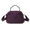 Nova Bolsa Transversal Multicamadas 2026, Bolsa de Tecido Portátil Casual Versátil com Múltiplos Bolsos, Bolsa de Ombro Leve Resistente à Água para Mulheres