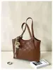 Bolso acolchado grande casual de moda para mujer, nuevo bolso tote vintage transfronterizo de gran capacidad para el trabajo, bolso de hombro simple y texturizado