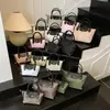 Bolsa Longxiang Popular Europeia e Americana Bolsa Feminina Mini de Mão com Padrão Bolsa de Mão Fashion Versátil Bolsa de Ombro Transversal