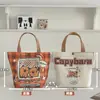 Nueva Bolsa de Lona Estilo Dibujo Animado Linda Gatito Bolso de Mano para Estudiante Versátil de Verano Ropa de Trabajo Bolsa de Gran Capacidad