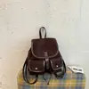 2026 Nova Mochila Retro de Camurça Feminina Casual Estudante Bolsa Escolar de Alta Qualidade para Deslocamento Viagem