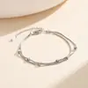 Pulseira de joia quadrada em aço inoxidável com contas empilhadas de camada dupla banhada a ouro para mulheres, projetada para exportação transfronteiriça