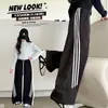 Pantalones súper estilosos de estilo urbano para niñas, nuevo modelo otoño 2026, pantalones deportivos casuales para niños, pantalones de pierna ancha para niños mayores y estudiantes de secundaria