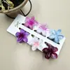 Clipes de Cabelo Coloridos de Flor de Plumeria de 4cm Mais Vendidos na Europa e América, Grampos de Cabelo Florais Transfronteiriços, Acessórios de Cabelo da Moda para Festas na Parte de Trás da Cabeça