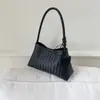 Bolsa de Ombro Feminina com Padrão Trançado Estilo Francês de Nicho para o Verão 2025 Elegante e Estilo Western para o Dia a Dia