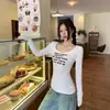 Estilo Deseo Puro Modelo 2026 Otoño Nueva Camiseta de Manga Larga Ajustada que Resalta la Clavícula con Diseño de Cuello en U para Mujer