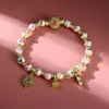 Pulsera Estilo Ins con Esmalte Cloisonné y Perlas Doradas Arena, Diseño de Nicho, Versátil y Elegante, Disponible en Múltiples Colores