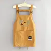 Delantal Ajustable Estilo Coreano para Cocina y Hogar, Delantal Impermeable de Dibujos Animados para Hombres y Mujeres, Adecuado para Catering y Trabajo, con Texto Impreso