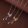 Suministro Exclusivo Transfronterizo de Collar Cadena Clavícula con Borla de Lazo y Zirconia Forma de Gota de Agua para Mujer, Moderno, Lujo Ligero, Elegante y de Gama Alta