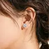 Pendientes de botón de trébol de cuatro hojas giratorio de plata pura s999 seleccionada cuidadosamente, simples, elegantes, atmosféricos, sensación de alta gama