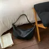 Bolso cruzado simple de axila estilo coreano, nuevo modelo 2026, bolso cruzado texturizado para el trabajo y los desplazamientos, bolso de bola de masa moderno y a la moda