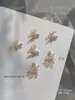 Nuevo taladro de uñas de circón Qiansi Mengdie decoraciones de alas de mariposa de doble ala tridimensionales para uñas venta al por mayor