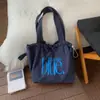 Shuai Mijia 2026 Verano Nuevo Bolso de Lona con Letras de Nicho Bolso Tote de Gran Capacidad Bolso de Hombro Único para Viajes Diarios Bolso para Mujer