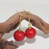 Versión coreana de los aretes de perlas windy más vendidos, aretes Joker simples de moda con aretes de libro rojo pequeño, suministro al por mayor