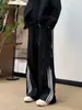 Pantalones Casuales Desestructurados con Cremallera y Tres Rayas para Hombres y Mujeres Sueltos Versátiles Deportivos Simples Modernos de Moda Pierna Recta Largos