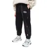 Pantalones de primavera y otoño para niños y niñas 2023 nuevos niños casual ropa exterior pantalones deportivos Joker de primavera y otoño para niños al por mayor