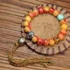 Hueso de Vaca Estilo Xizang Perla Redonda Antigua de Hueso Pulido Pulsera de Círculo Único para Mano Estilo Étnico Borla Tejida a Mano Joyería Retorcida a Mano Venta al por Mayor