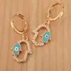 Europa y Estados Unidos moda transfronteriza ojo de diablo palma pendiente de gota de oreja modelado personalidad hermoso hip-hop temperamento aretes de clip para oreja venta al por mayor