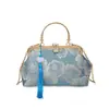Bolso de noche bordado de estilo chino de alta calidad y a la moda, bolso de mano popular nuevo 2026, bolso de seda de un solo hombro para banquetes para mujer