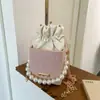 Tendência de Moda Transfronteiriça Cor Sólida Pérola Bolsa Quadrada Pequena 2025 Novo Design de Nicho Bolsa de Ombro com Corrente Versátil e Estilosa