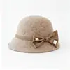 Novo chapéu bucket de lã para mulheres, estilo Hepburn francês outono/inverno, com laço, elegante e versátil, faz o rosto parecer menor, chapéu de pescador
