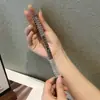 Adecuado para Apple iwatch7/SE/6/5/4/3 correa de metal con diamantes + funda tipo ladrillo estilo pequeño y fragante punto