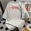 Camiseta de Manga Curta com Estampa de Letras Estilo Ins Casal Gola Redonda Verão 2025 Top Solto Estilo Hiphop para Mulheres