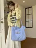Bolso versátil de verano transfronterizo nuevo modelo 2026 de gran capacidad bolso de mano al hombro bolso tote simple de nicho bolsa de compras